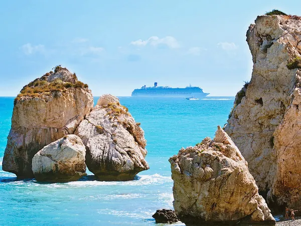 Aphrodite’s Rock with a cruise ship on the horizon