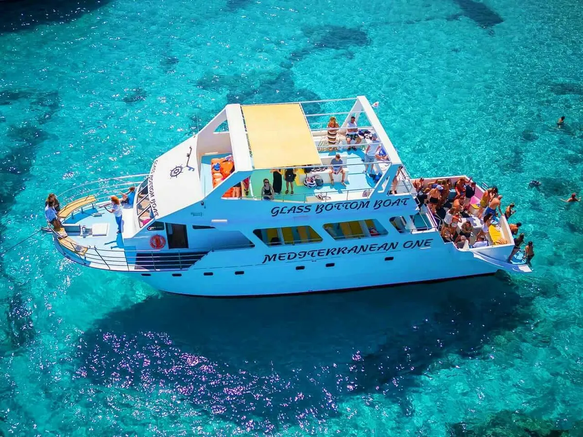 The Mediterranean One boat anchored in turquoise water
