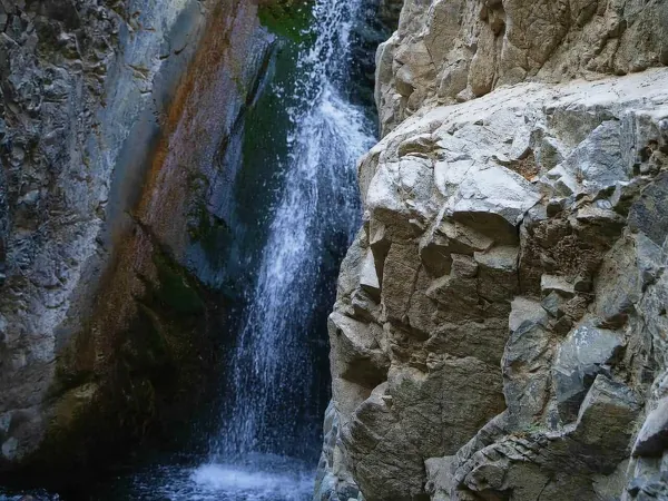 Millomeris waterfall in a rocky gorge