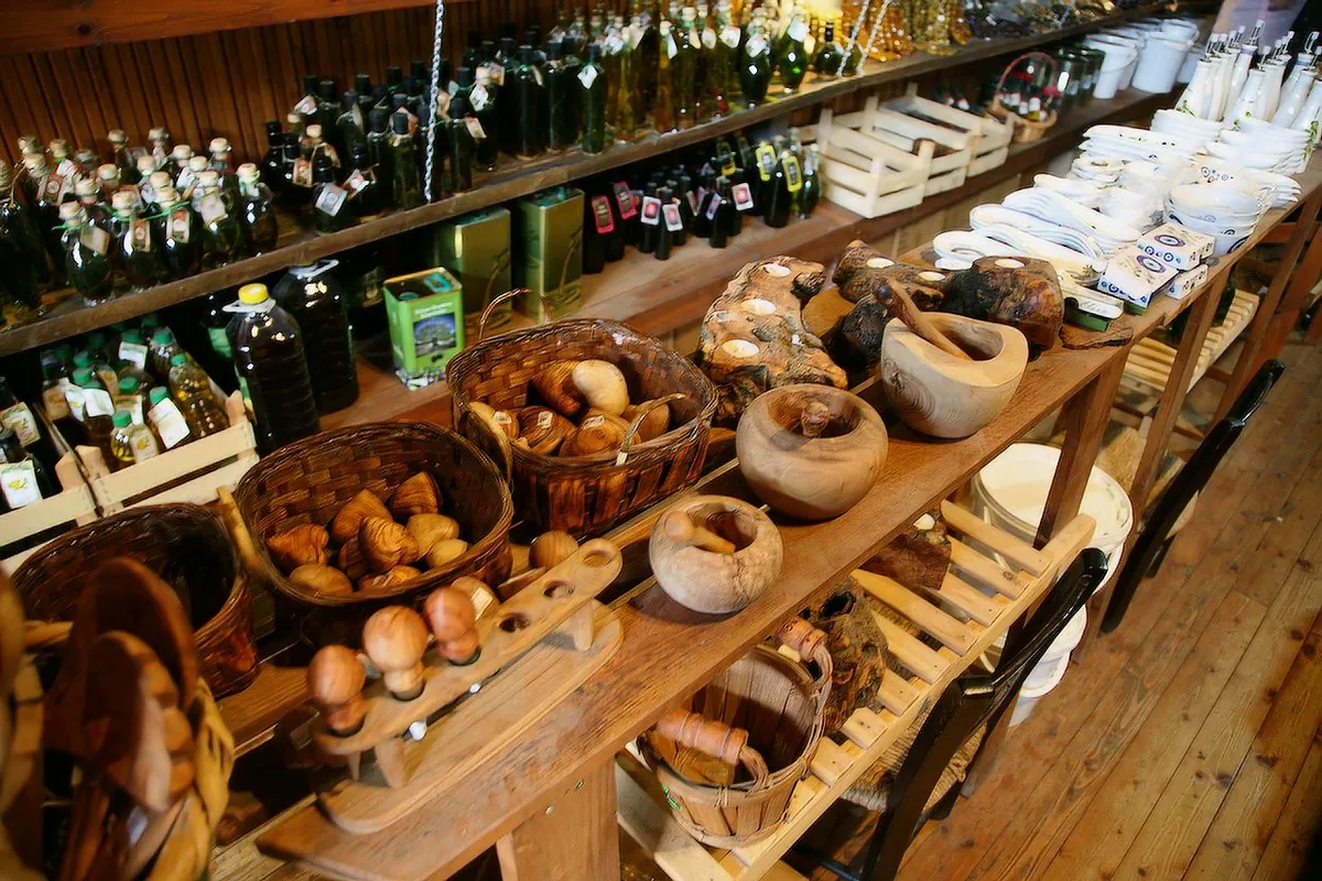 Shelves of olive oil and local products in a farm shop