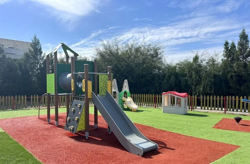 Slides and swings at Greenfield PlayPark