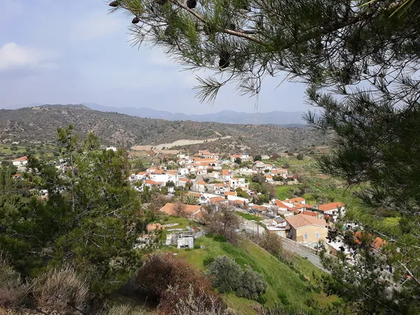 Vasa Koilaniou on its hillside with mountains behind