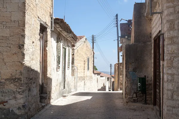 Narrow lane between old stone houses in Vouni